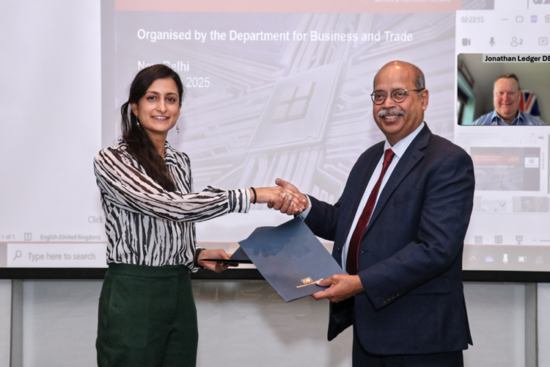 CII Executive Director Sougata Roy Choudhury and DBT's Krishna Joshi exchange signed MOUs for UKSP.